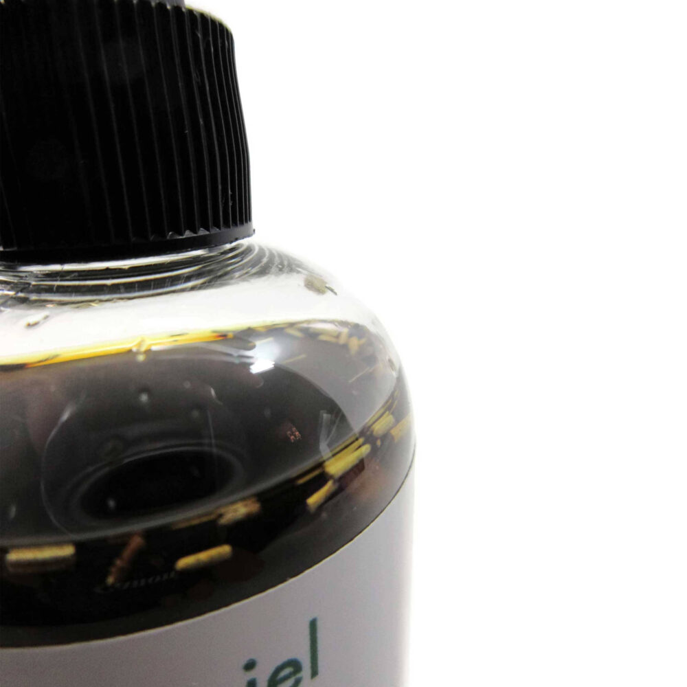 Super Concentrated Herbal Hair Oil, Close up photo of bottle