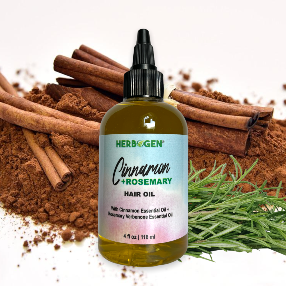Bottle of 4 oz Cinnamon Rosemary Hair Oil with Cinnamon and rosemary in the background
