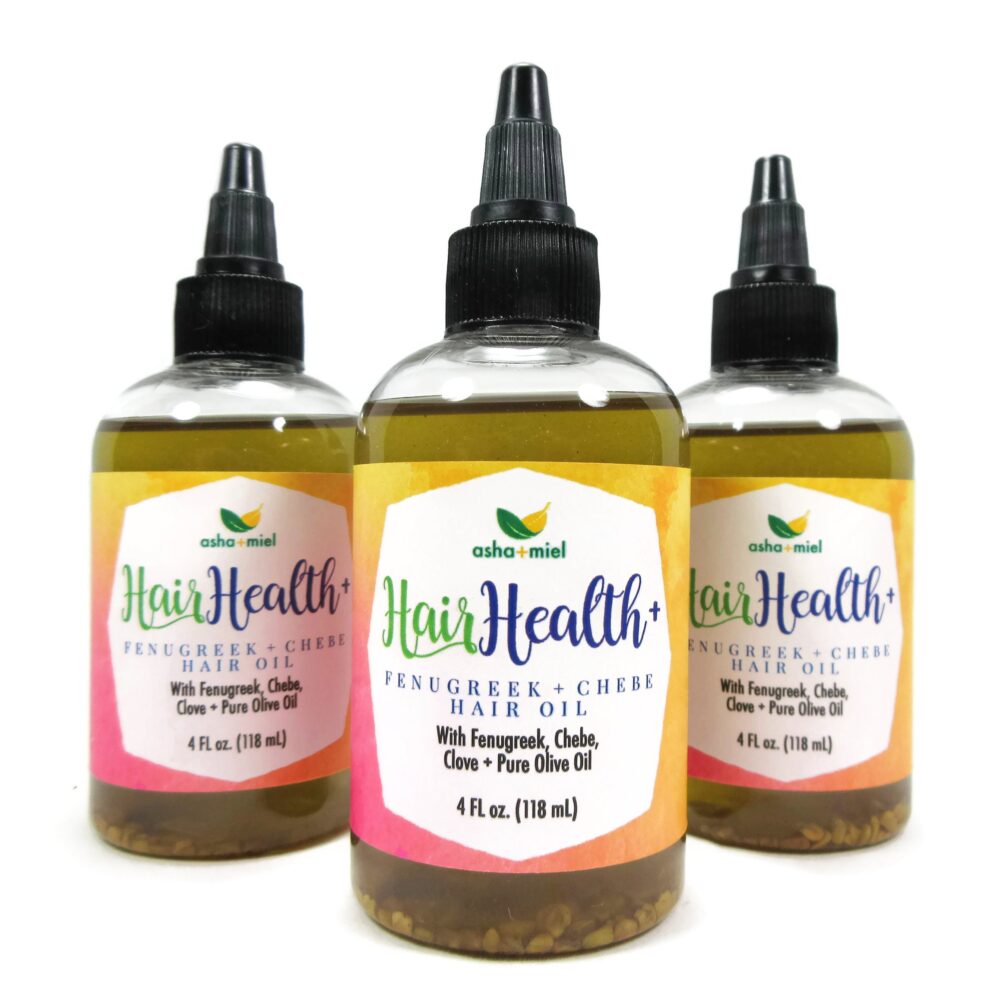 Three bottles of Fenugreek and Chebe Hair Oil, all are in 4 ounce plastic bottles