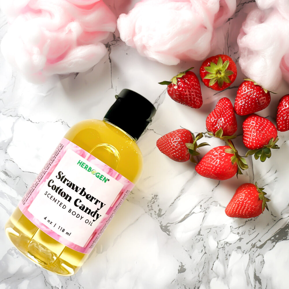 Strawberry Cotton Candy Body Oil, 4 oz spout bottle with Strawberries in background