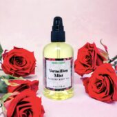 4 ounce bottle of Vermilion Mist Body Oil with red roses